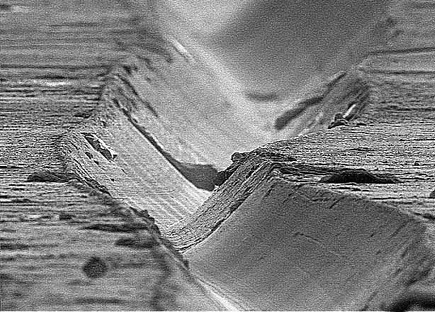 vinyl record groove at 1,000x zoom